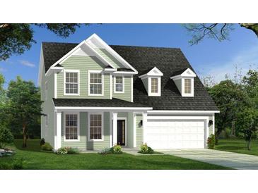 Charming two-story home with a well-manicured lawn and a two-car garage at 409 Cadbury Loop, Summerville, SC 29486
