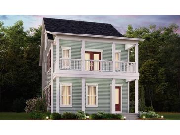 Charming two-story home with a double porch, white railings, and red doors nestled in lush greenery at 339 Trailmore Ln, Summerville, SC 29486