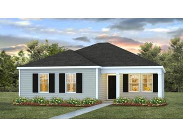 Charming single-story home featuring a welcoming front porch and manicured landscaping at 6226 Gritman Dr, Hollywood, SC 29470