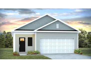 Charming single-Gathering home with a well-manicured lawn and an attached two-car garage at 8018 Rackham Rd, Hollywood, SC 29470