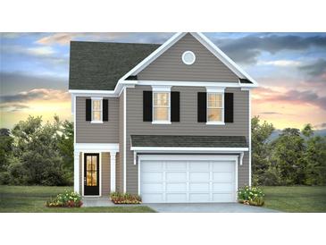 Charming two-story home with gray siding, black shutters, and a two-car garage at 347 Dickerson Ln, Lincolnville, SC 29485