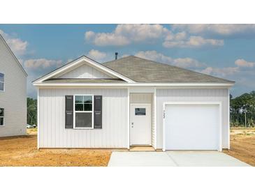 Charming single-story home with a white exterior and a one-car garage at 722 Long Bluff Rd, Summerville, SC 29486