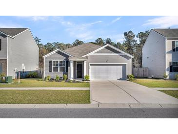 Charming single-Gathering home with gray siding, a two-car garage, and a well-manicured lawn at 259 N Light Way, Summerville, SC 29486