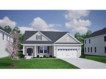 Charming one-story home with gray siding, black shutters, attached two-car garage, and manicured lawn at 121 Seaton Street, Summerville, SC 29486
