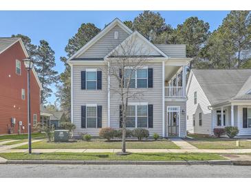 Charming two-story home with a cozy front porch and traditional curb appeal at 3073 Moonlight Dr, Charleston, SC 29414