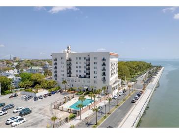 Stunning building featuring a swimming pool, parking, and picturesque water views along the scenic waterfront at 1 King St # 209/210, Charleston, SC 29401