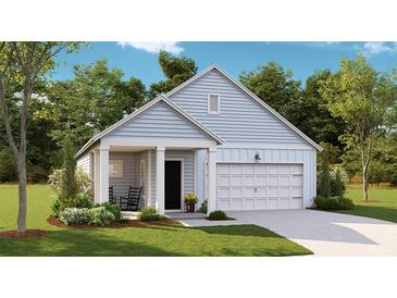 Charming one-story home with light blue siding, a covered front porch, and an attached two-car garage at 1025 Swamp Rose Run, Summerville, SC 29485