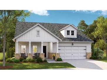 Charming single-Gathering home with a two-car garage, a cozy front porch, and well-maintained landscaping at 1151 Darling St, Summerville, SC 29485