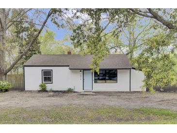Charming renovated home with a light blue door and updated windows at 2916 Louise Dr, North Charleston, SC 29405