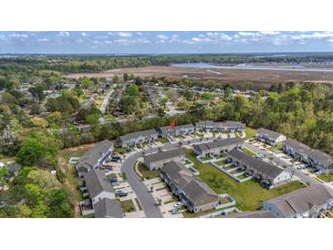 Desirable townhouse community with lush landscaping and convenient parking at 7787 Montview Rd, North Charleston, SC 29418