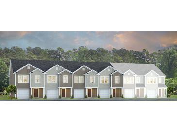 New townhomes showing exterior elevation in a variety of neutral colors, with a tree-lined horizon at 166 Yarrow Way, Moncks Corner, SC 29461