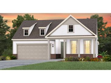 Charming two-story home with white siding, a gray roof, an attached garage and a well-manicured lawn at 267 Garden Gate Way, Summerville, SC 29486