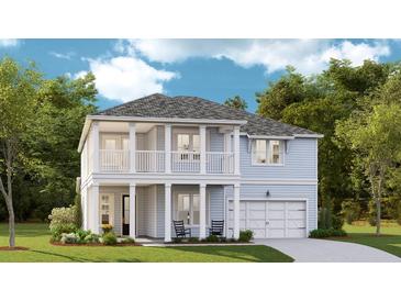 Charming two-story home with a covered front porch and second story balcony at 96 French Garden Cir, Summerville, SC 29486