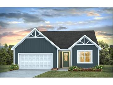 Charming single-Gathering home boasts a classic design, complemented by a well-manicured lawn and an attached garage at 406 Peachwood Ln, Moncks Corner, SC 29461
