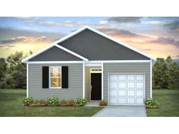 Charming single-story home featuring a welcoming entrance, a gray facade, and a manicured lawn at 7015 Deanston Dr, Ravenel, SC 29470