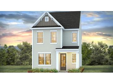 Charming two-story home with light gray siding, a covered porch, and manicured landscaping in a desirable neighborhood at 114 Midmills Ln, Summerville, SC 29486