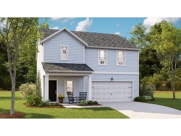 Charming two-story home with light blue siding, a front porch, a two car garage, and a well manicured lawn at 116 Moscato Ln, Summerville, SC 29485