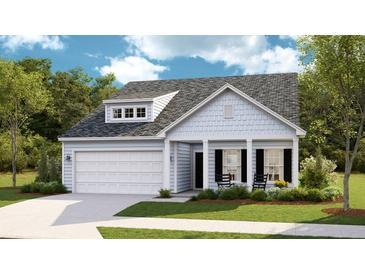 Charming single-Gathering home featuring a two-car garage, covered porch and beautiful landscaped front yard at 257 Camellia Bloom Dr, Moncks Corner, SC 29461