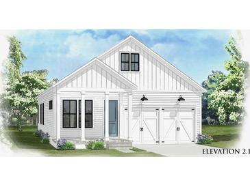 Charming white two-story home with black framed windows, covered front porch, and a two car garage at 352 Trailmore Ln, Summerville, SC 29486