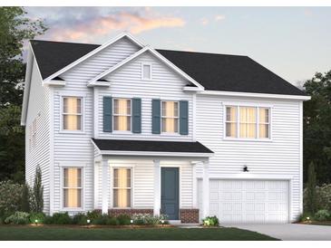 Charming two-story home with white siding, a black roof, and an attached two-car garage at 455 White Magnolia St, Moncks Corner, SC 29461