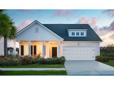 Charming single-Gathering home featuring a covered front porch, well-manicured lawn, and an attached two-car garage at 195 Belfort Pl, Summerville, SC 29486