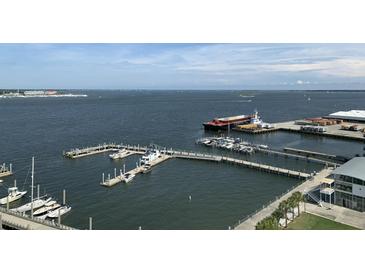 Stunning aerial view of waterfront property with docks and ocean access at 330 Concord St # 11B, Charleston, SC 29401