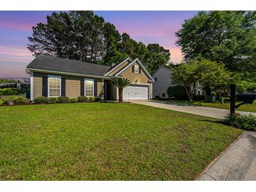 Charming single-Gathering home with well-maintained lawn and inviting curb appeal at 522 Antebellum Ln, Mount Pleasant, SC 29464