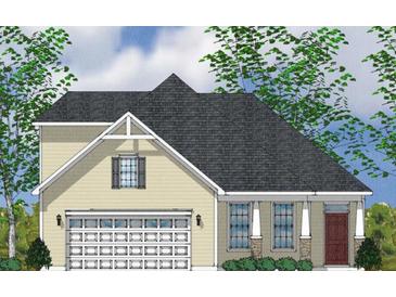 Charming home featuring a two-car garage, stone accents and well-manicured landscaping at 113 Seaton St, Summerville, SC 29486