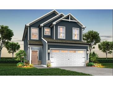 Charming two-story home with a two-car garage and beautiful landscaping at 180 Surfbird Rd # 640, Summerville, SC 29486