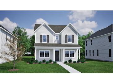 Charming two-story home featuring gray siding, black shutters, and a well-manicured front lawn at 102 Brown Cow Way, Summerville, SC 29483