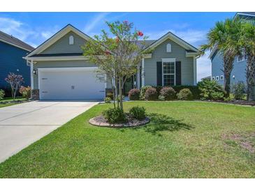 Charming single-story home with well-maintained lawn and flowering tree in a Gathering-friendly neighborhood at 234 Basket Grass Ln, Summerville, SC 29486