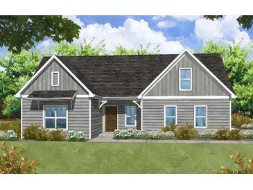 Charming single-story home with gray siding, gabled roof, and well-manicured lawn at 1960 Central Ave, Summerville, SC 29483
