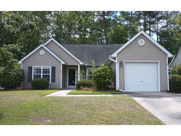 Charming single-story home features a one-car garage and well-maintained landscaping in a tree-lined neighborhood at 5276 Copley Cir, Summerville, SC 29485