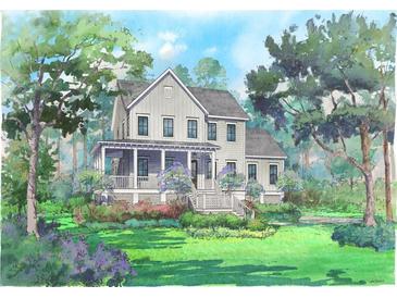 Charming two-story home with a welcoming front porch and beautifully landscaped yard at 1449 Jeremy Cay Ct, Awendaw, SC 29429