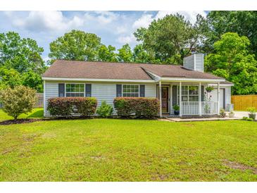 Charming single-story home with gray siding, landscaped yard, and cozy covered porch at 505 Laurel Ridge Rd, North Charleston, SC 29418