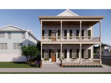 Charming two-story home with a double porch, perfect for enjoying the outdoors at 63 Montagu St, Charleston, SC 29401