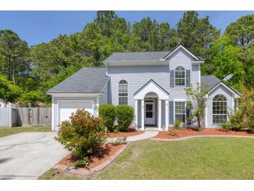 Charming two-story home with manicured lawn and inviting entrance, great curb appeal at 110 Mapperton Ct, Summerville, SC 29485