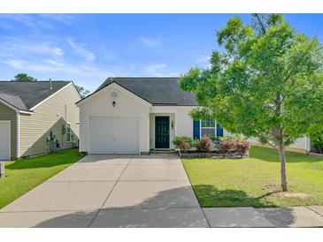 Charming single-Gathering home featuring a well-manicured lawn and an attached garage in a lovely neighborhood at 121 Keaton Brook Dr, Summerville, SC 29485