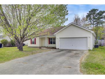 Charming single-story home with attached garage and well-maintained front yard and driveway at 109 Wisteria Ct, Summerville, SC 29486