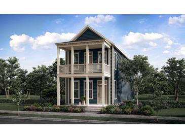 Charming two-story home with a covered porch, beautiful landscaping, and a classic exterior design at 708 Rumbling Leaf Ln, Summerville, SC 29486