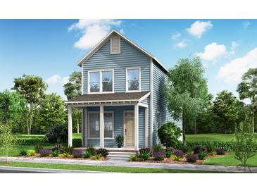 Charming two-story home featuring lap siding, a covered porch, and a neatly landscaped front yard at 814 Gentle Breeze Dr, Summerville, SC 29486