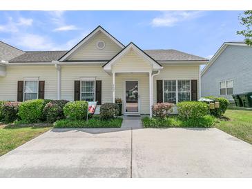 Inviting one-story home featuring a well-maintained front yard and neutral color palette at 157 Townsend Way, Summerville, SC 29483