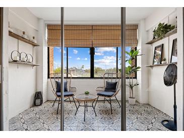 Relaxing balcony featuring stylish seating and a beautiful view at 14 Lockwood Dr # 1C, Charleston, SC 29401