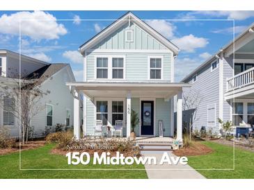 Charming two-story home featuring a welcoming front porch and professionally landscaped yard at 150 Midtown Ave, Summerville, SC 29486
