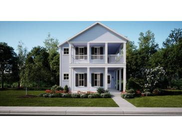 Charming two-story home featuring a double porch, light blue siding, black shutters, and lush landscaping at 786 Clay Field Trl, Summerville, SC 29485