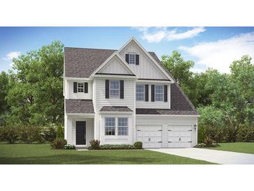 Charming two-story home features a symmetrical façade, black shutters, and a well-manicured lawn at 527 Verdi Drive Dr, Summerville, SC 29486