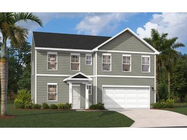 Two-story home with neutral siding, white trim, and a two-car garage at 4111 Rising Tide Dr, Summerville, SC 29485