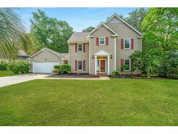 Charming two-story home with red shutters and lush green lawn, perfect for Gathering living at 113 Essex Dr, Summerville, SC 29485
