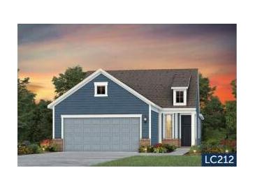 Charming blue two-story home featuring an attached two car garage, lovely landscaped yard and welcoming front entry at 740 Blue Iris Way, Summerville, SC 29486