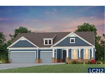 Charming single-story home with a welcoming front porch and a spacious two-car garage at 545 Pink Lily Ln, Summerville, SC 29486